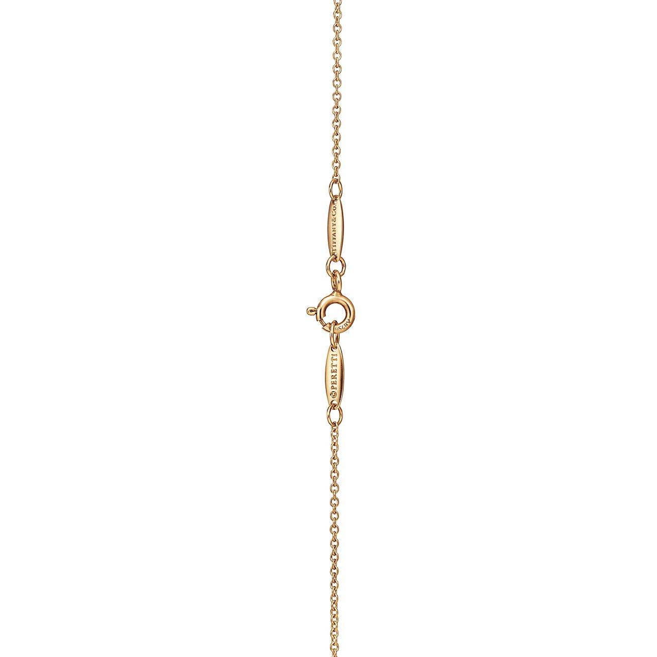 T*f*ny  elsa peretti® open heart pendant in yellow gold with rubies, 16 mm