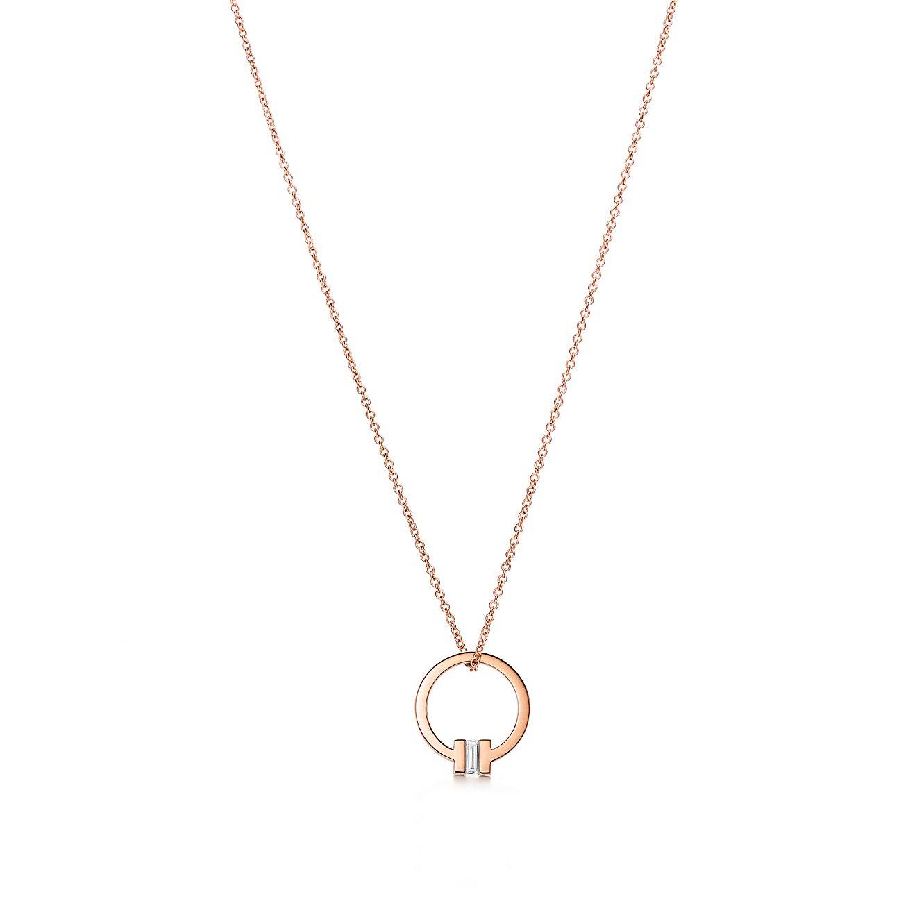 T*f*ny t pendant in 18k rose gold with a baguette diamond