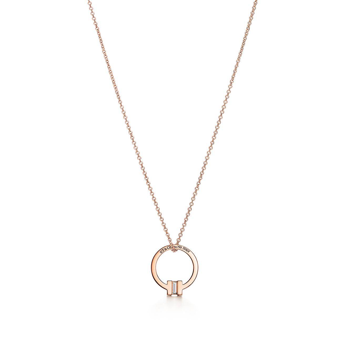 T*f*ny t pendant in 18k rose gold with a baguette diamond