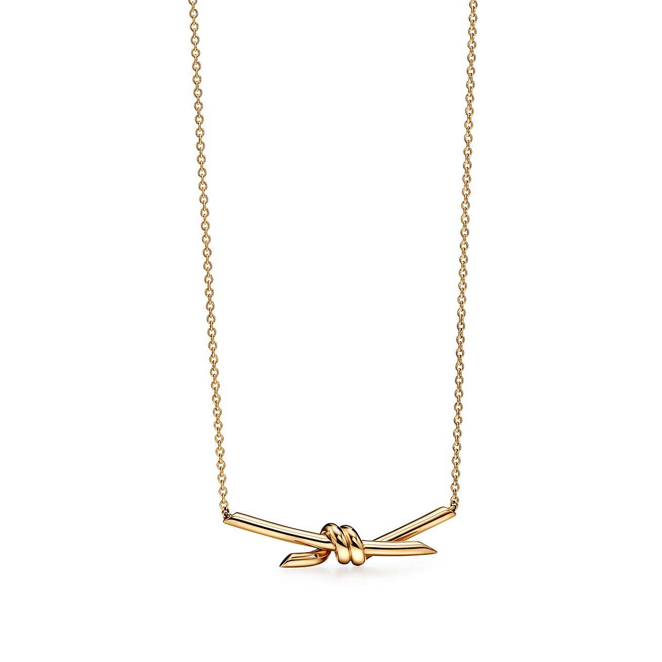 T*f*ny knot pendant in yellow gold