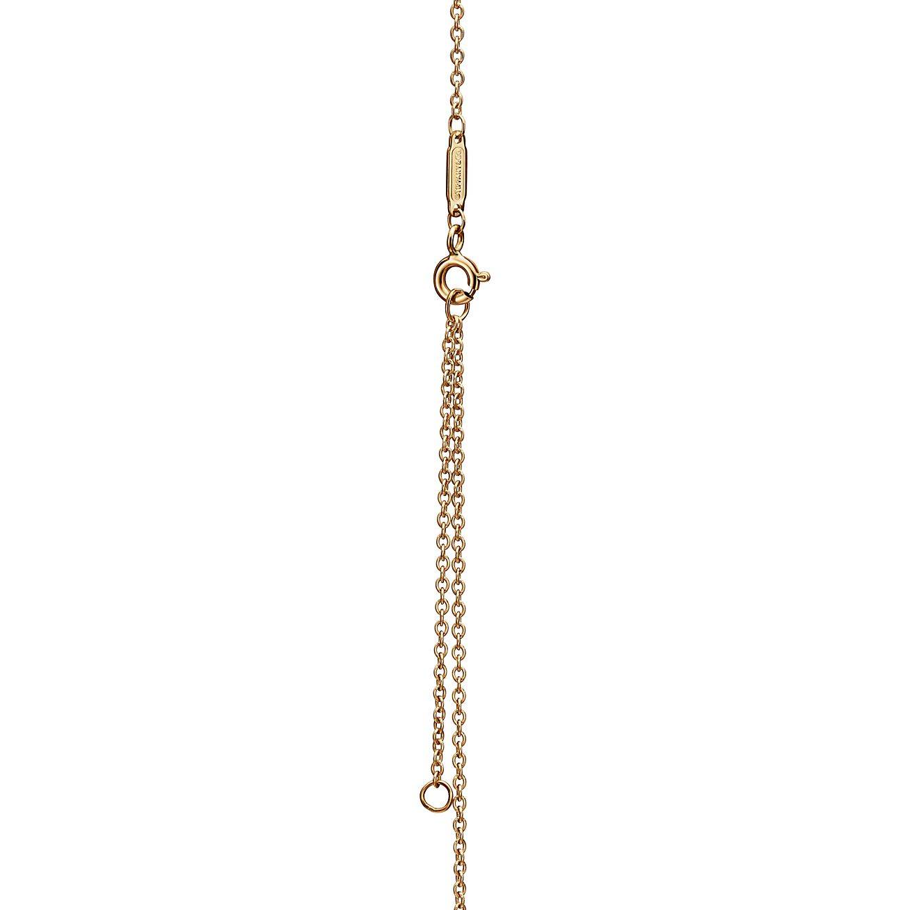 T*f*ny knot pendant in yellow gold