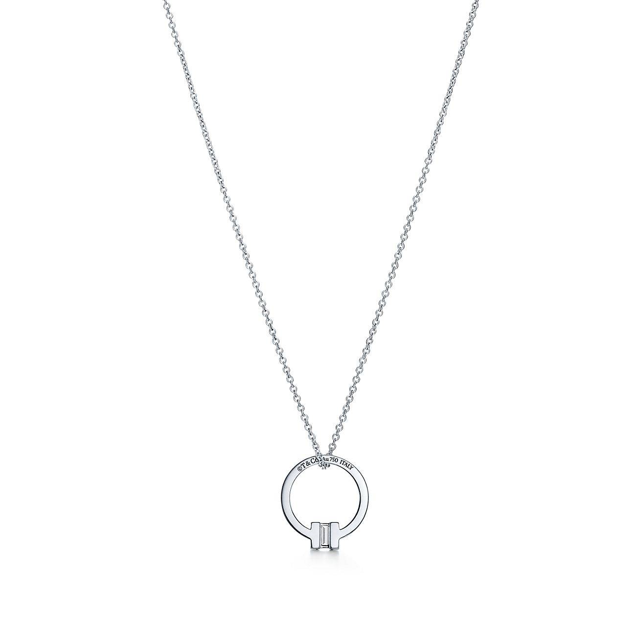 T*f*ny t pendant in 18k white gold with a baguette diamond